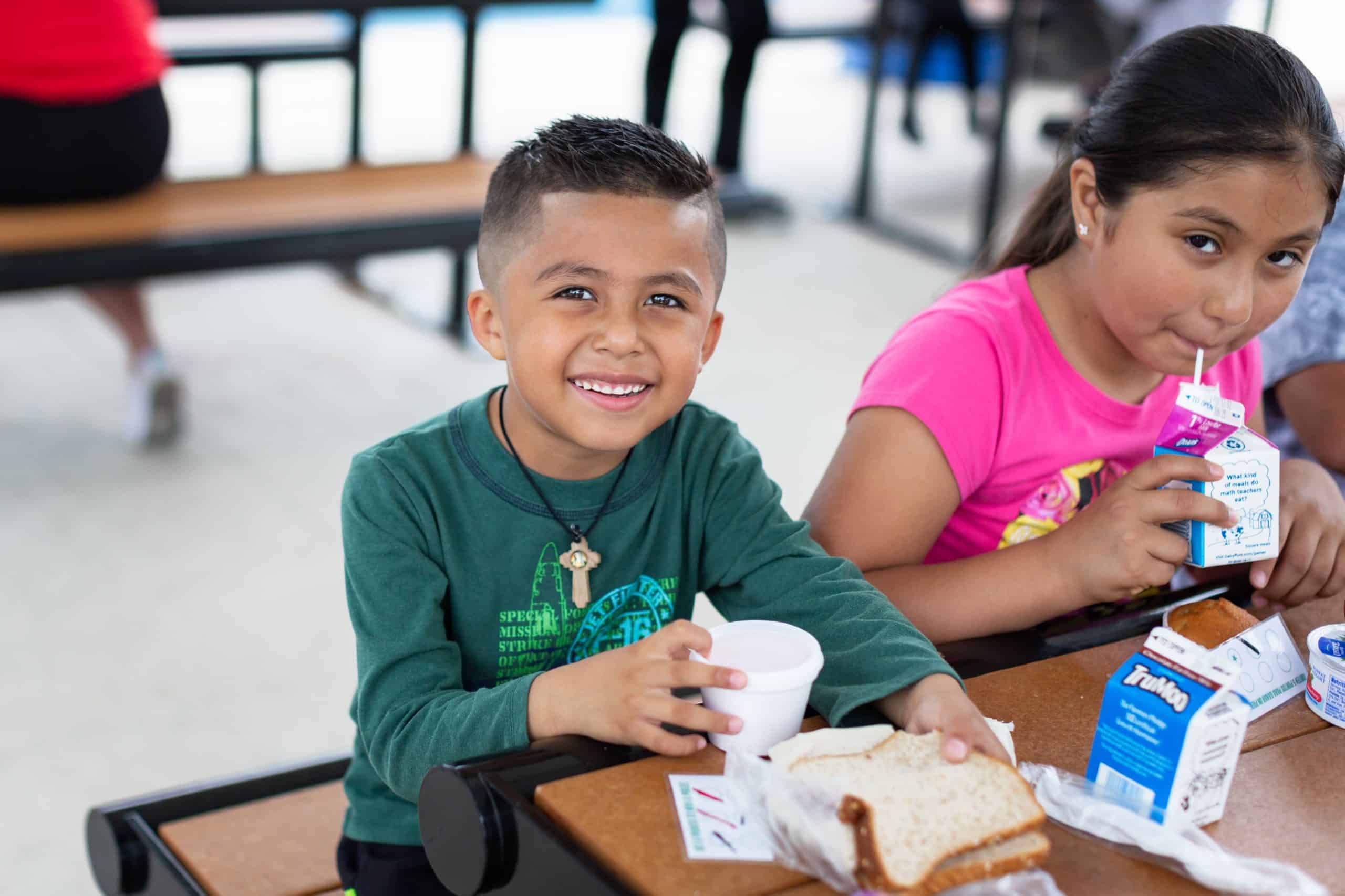 6-year-old Gael eats lunch at Blackhawk Park, a summer meals site in Aurora, Illinois. 

Used - Nutrition Month 2021